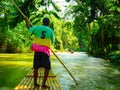 Jamaica Martha Brae River Guide on Raft Royalty Free Stock Photo